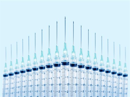 diabetes care - Stock image of syringes in formation. Focus on front syringe. Stock Photo - Budget Royalty-Free & Subscription, Code: 400-04647745