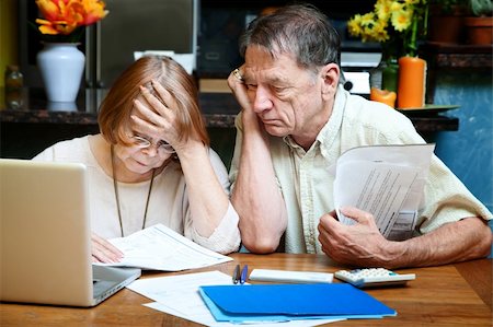 simsearch:400-04744719,k - Senior couple at home reacting to many bills Stock Photo - Budget Royalty-Free & Subscription, Code: 400-04647956