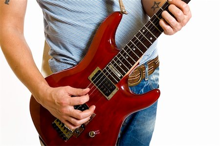 simsearch:400-06134635,k - Close up of an electric guitar being played Stock Photo - Budget Royalty-Free & Subscription, Code: 400-04648061