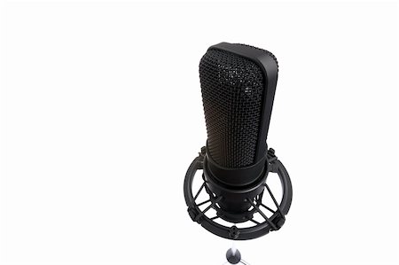 simsearch:400-04304525,k - Black microphone isolated on white. Shot with wide lens. Foto de stock - Super Valor sin royalties y Suscripción, Código: 400-04648585