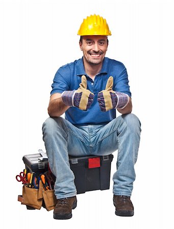simsearch:400-04648821,k - positive and confident young caucasian handyman sit on toolbox Foto de stock - Royalty-Free Super Valor e Assinatura, Número: 400-04648821