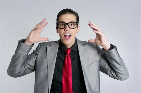 simsearch:400-04688299,k - Businessman crazy with funny glasses and suit on gray background Stock Photo - Budget Royalty-Free & Subscription, Code: 400-04649191