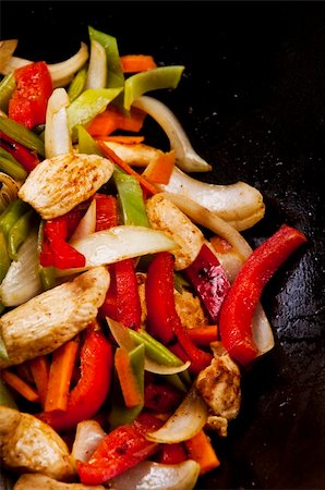 stir fry red peppers - Chicken stir fry with red peppers onion and green beans Stock Photo - Budget Royalty-Free & Subscription, Code: 400-04640267