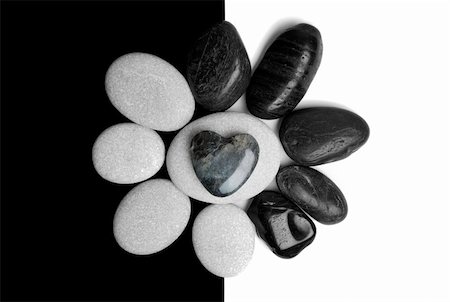 simsearch:400-04640528,k - Two sets of pebbles on contrasting backgrounds with a stone heart in the centre Stock Photo - Budget Royalty-Free & Subscription, Code: 400-04640317