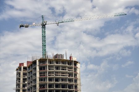 simsearch:400-05713038,k - steel crane above incomplete building, sky with clouds Stock Photo - Budget Royalty-Free & Subscription, Code: 400-04640870