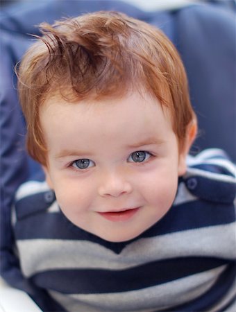 a smiling boy with a modern hairstyle Stock Photo - Budget Royalty-Free & Subscription, Code: 400-04642106