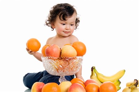 simsearch:640-05760987,k - Baby with fruits,isolated on a white background. Photographie de stock - Aubaine LD & Abonnement, Code: 400-04642704