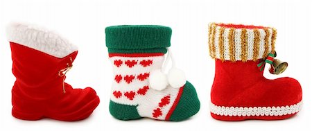 empty green color background - Empty christmas boots isolated on white background Photographie de stock - Aubaine LD & Abonnement, Code: 400-04643005