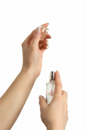 spray bottle perfume - Woman applying perfume on her right wrist, from  luxury bottle.  Isolated on white. Stock Photo - Budget Royalty-Free & Subscription, Code: 400-04643032