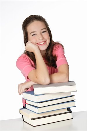 simsearch:400-04175049,k - Cute Caucasian girl working on homework Stock Photo - Budget Royalty-Free & Subscription, Code: 400-04643220
