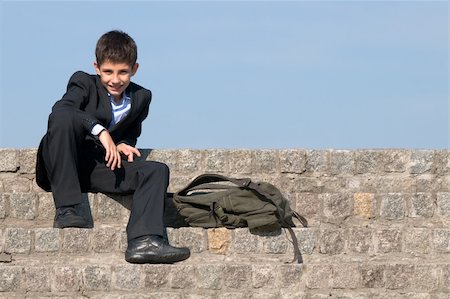 simsearch:400-04643781,k - a successful school student is sitting on the stones Stock Photo - Budget Royalty-Free & Subscription, Code: 400-04643781