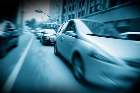 Fast car moving in motion on the street. Stock Photo - Budget Royalty-Free & Subscription, Code: 400-04654245