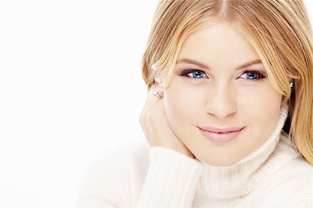 simsearch:400-04654369,k - Portrait of smiling blonde in the white sweater, isolated Stock Photo - Budget Royalty-Free & Subscription, Code: 400-04654368