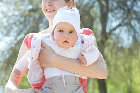 Mum with her child walk on park Stock Photo - Budget Royalty-Free & Subscription, Code: 400-04654547