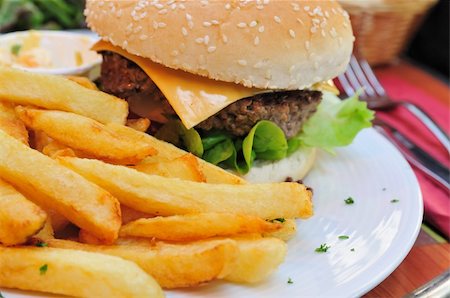 simsearch:400-05664697,k - Cheese burger - American cheese burger with fresh salad Stock Photo - Budget Royalty-Free & Subscription, Code: 400-04654629