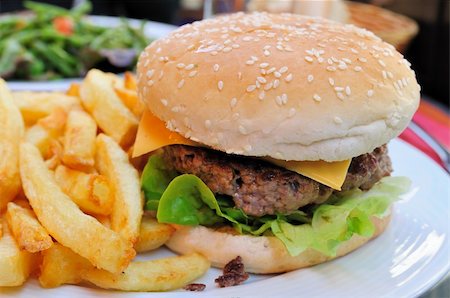 simsearch:400-05664697,k - Cheese burger - American cheese burger with fresh salad Stock Photo - Budget Royalty-Free & Subscription, Code: 400-04654630