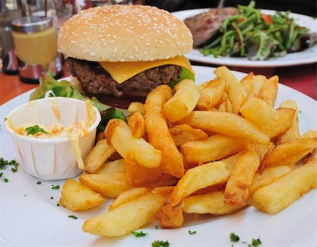 simsearch:400-05330097,k - Cheese burger - American cheese burger with fresh salad Stock Photo - Budget Royalty-Free & Subscription, Code: 400-04654632