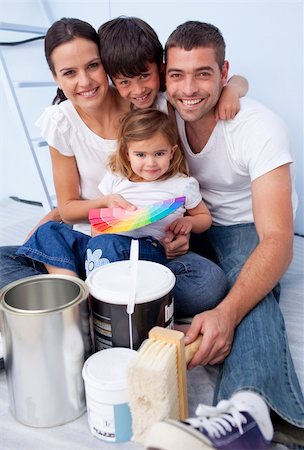 simsearch:400-04878558,k - Happy family chosing colours to paint new house Stock Photo - Budget Royalty-Free & Subscription, Code: 400-04654731