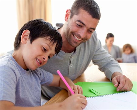 simsearch:400-04198769,k - Father helping his son doing homework at home Foto de stock - Super Valor sin royalties y Suscripción, Código: 400-04654743