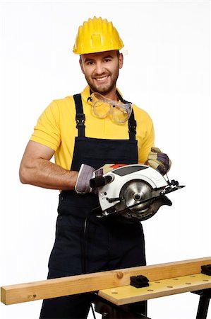 simsearch:400-04612522,k - caucasian positive young handyman ready to work isolated on white background Foto de stock - Royalty-Free Super Valor e Assinatura, Número: 400-04655016