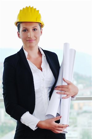 simsearch:400-04288994,k - young architect woman in business suit portrait with yellow hemet and blueprints Stock Photo - Budget Royalty-Free & Subscription, Code: 400-04655104