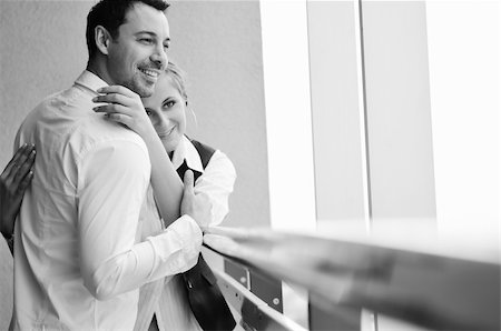 people and balcony and apartment - romantic happy couple relax and have fun at balcony in their new home apartment Stock Photo - Budget Royalty-Free & Subscription, Code: 400-04655227