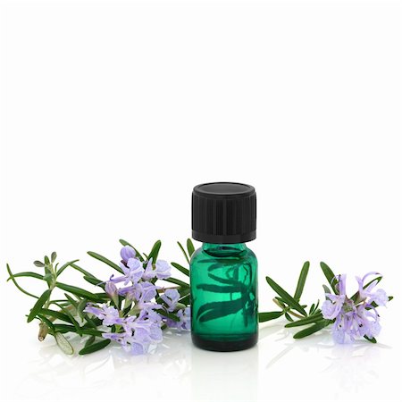 simsearch:400-04154039,k - Rosemary herb leaf sprig with flowers and an aromatherapy essential oil glass bottle, over white background. Stock Photo - Budget Royalty-Free & Subscription, Code: 400-04655325