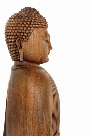 simsearch:400-05154191,k - Wooden buddha with eyes closed in prayer, over white background. Side view. Stock Photo - Budget Royalty-Free & Subscription, Code: 400-04655320