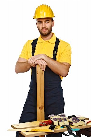 simsearch:400-04648821,k - confident handyman pose with tools on white background Foto de stock - Royalty-Free Super Valor e Assinatura, Número: 400-04656405