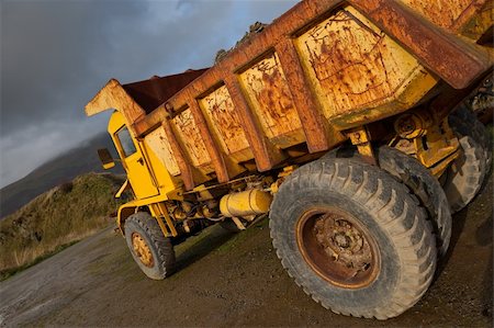 Bright yellow Tipper truck at a mine Stock Photo - Budget Royalty-Free & Subscription, Code: 400-04656543