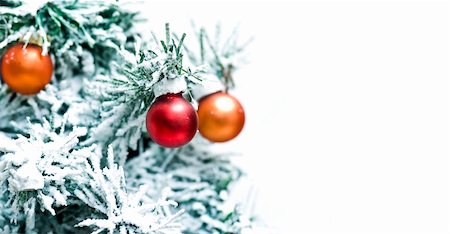 round ornament hanging of a tree - Christmas Tree with decorations Stock Photo - Budget Royalty-Free & Subscription, Code: 400-04656551