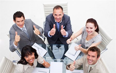 simsearch:400-04187718,k - Exuberant business team with thumbs up in the office Foto de stock - Royalty-Free Super Valor e Assinatura, Número: 400-04657452