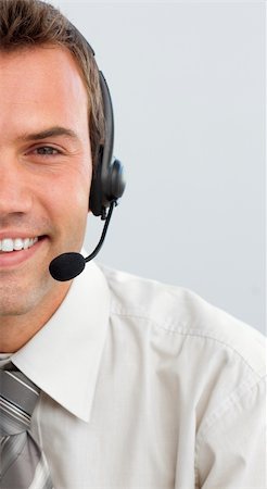 simsearch:400-03990860,k - Portrait of an attractive businessman with a headset on Photographie de stock - Aubaine LD & Abonnement, Code: 400-04657486