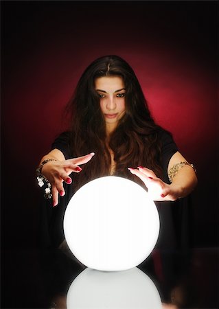 simsearch:400-08187790,k - Fortuneteller with magic sphere Photographie de stock - Aubaine LD & Abonnement, Code: 400-04658360