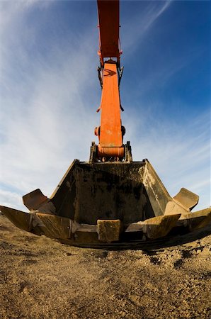 Big backhoe bucket coming at you.  Shot with fisheye. Stock Photo - Budget Royalty-Free & Subscription, Code: 400-04658888