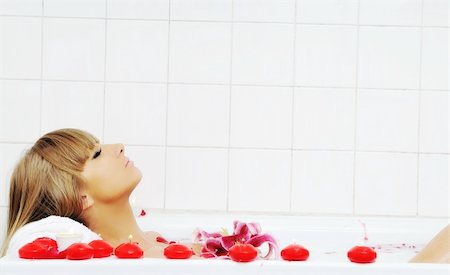 woman beauty spa and wellness treathment with red flower petals in bath Stock Photo - Budget Royalty-Free & Subscription, Code: 400-04659350