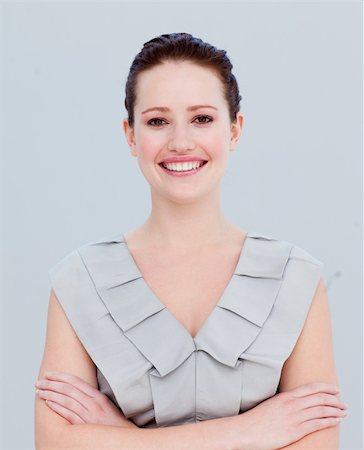 simsearch:400-05118165,k - Portrait of a beautiful businesswoman with folded arms smiling at the camera Stock Photo - Budget Royalty-Free & Subscription, Code: 400-04659648