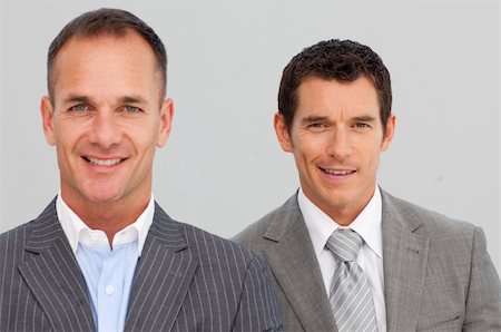 simsearch:400-05118165,k - Portrait of confident two businessmen with folded arms Stock Photo - Budget Royalty-Free & Subscription, Code: 400-04659651