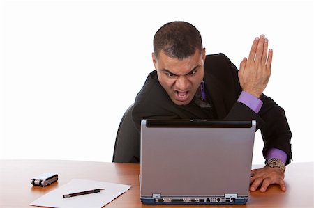 simsearch:400-08258105,k - Closeup of businessman which is stressed, because of a computer problem. Isolated on white. Stock Photo - Budget Royalty-Free & Subscription, Code: 400-04650213