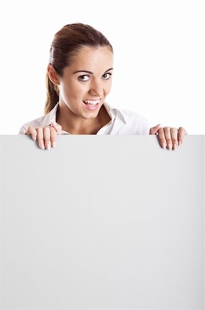 simsearch:400-05368656,k - Portrait of a beautiful woman holding a blank billboard Stockbilder - Microstock & Abonnement, Bildnummer: 400-04650923