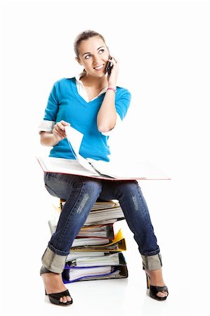 simsearch:400-04649503,k - Beautiful female student making a phone call isolated on white Stock Photo - Budget Royalty-Free & Subscription, Code: 400-04650930