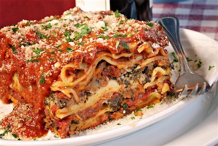 simsearch:400-06686774,k - Plate of lasagna at an Italian restaurant Stock Photo - Budget Royalty-Free & Subscription, Code: 400-04651077