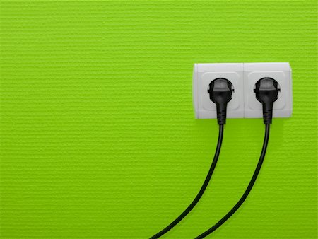 simsearch:400-05317787,k - Electric outlets on green wall Stock Photo - Budget Royalty-Free & Subscription, Code: 400-04651464