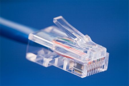 ethernet cords - RJ45 plug on a network cable. Stock Photo - Budget Royalty-Free & Subscription, Code: 400-04651520