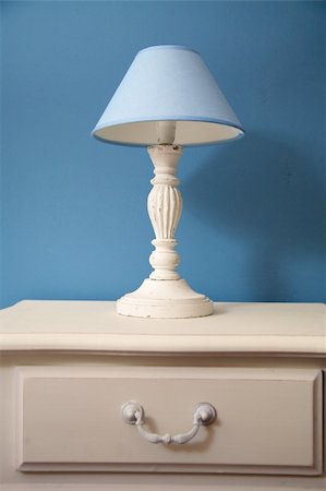 white bedside table and lamp with blue lampshade Stock Photo - Budget Royalty-Free & Subscription, Code: 400-04651946