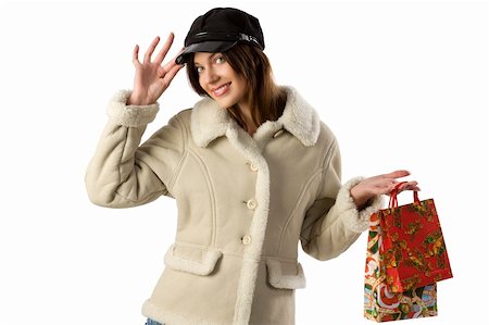 beautiful girl in winter dress making christmas shopping with a nice black hat Stock Photo - Budget Royalty-Free & Subscription, Code: 400-04652035