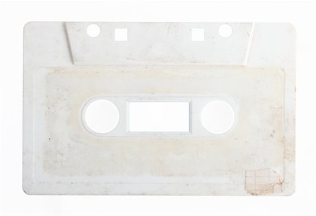 simsearch:400-05904692,k - White cassette over empty background. Old object Stock Photo - Budget Royalty-Free & Subscription, Code: 400-04652067