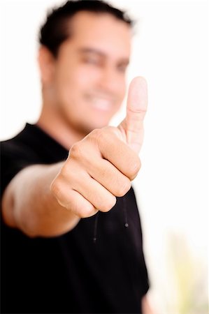 Young man with his hands expressing a positive attitude. Looking at camera, Foto de stock - Royalty-Free Super Valor e Assinatura, Número: 400-04652076