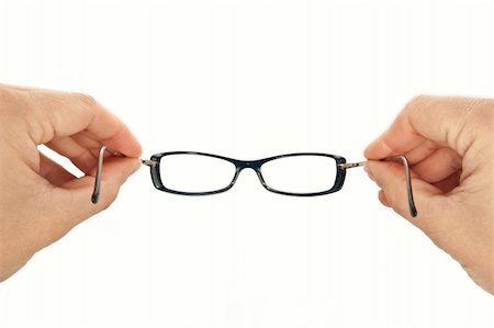 eye doctor test - man put on glasses, isolated white fill Stock Photo - Budget Royalty-Free & Subscription, Code: 400-04652429
