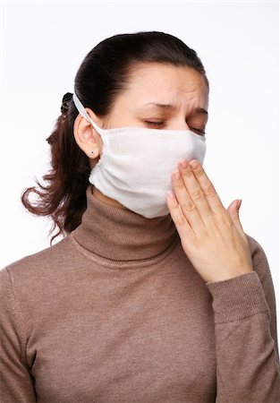 Coughing woman in a medical mask on a white background Foto de stock - Royalty-Free Super Valor e Assinatura, Número: 400-04652748